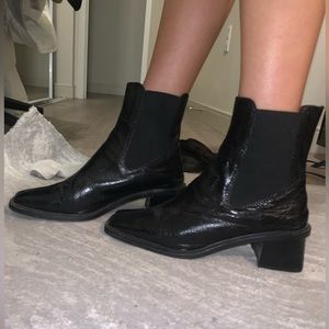Leather Topshop boots on a little heel with a square toe. Great condition.